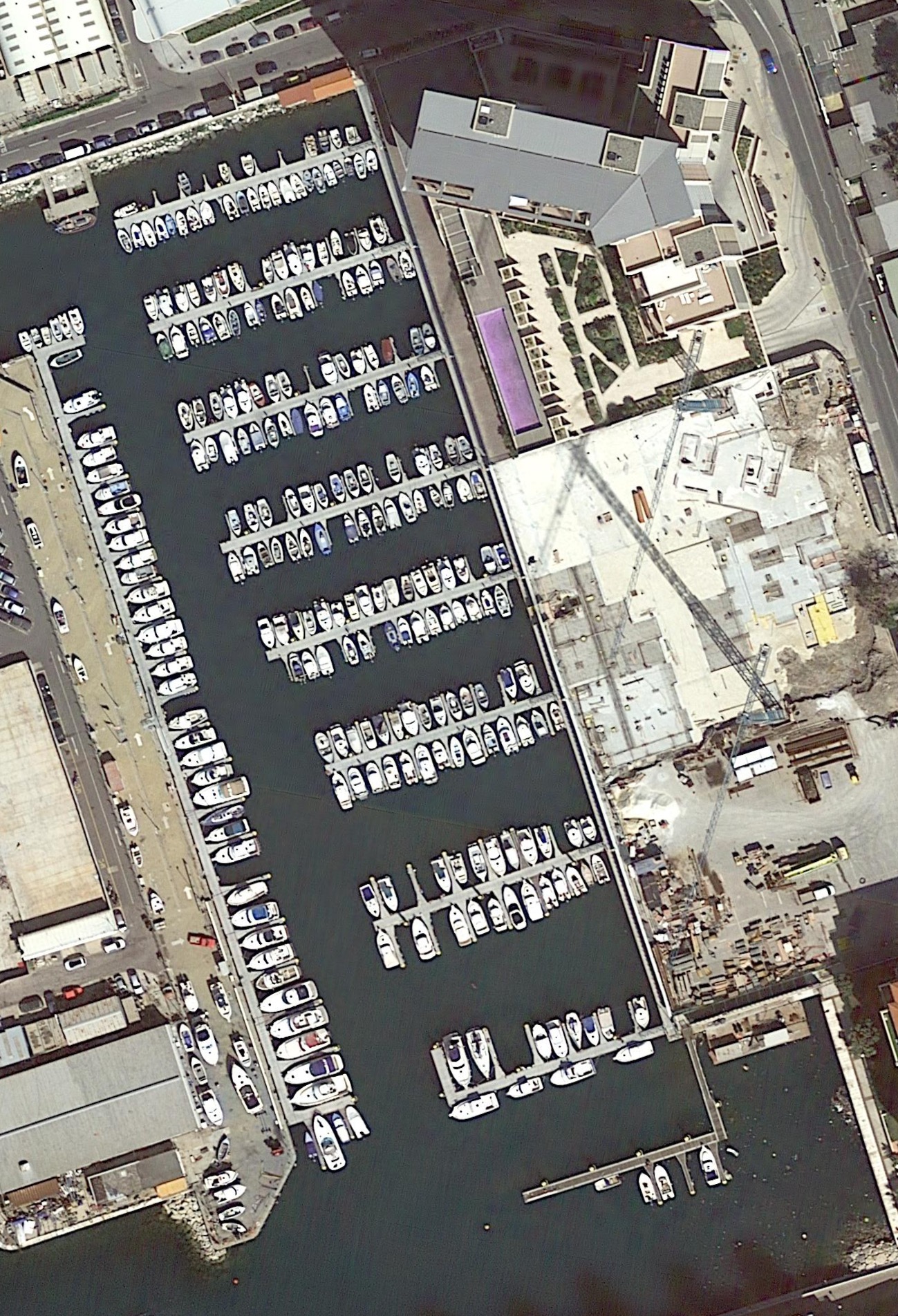 Input aerial tile — harbor with ships at many headings