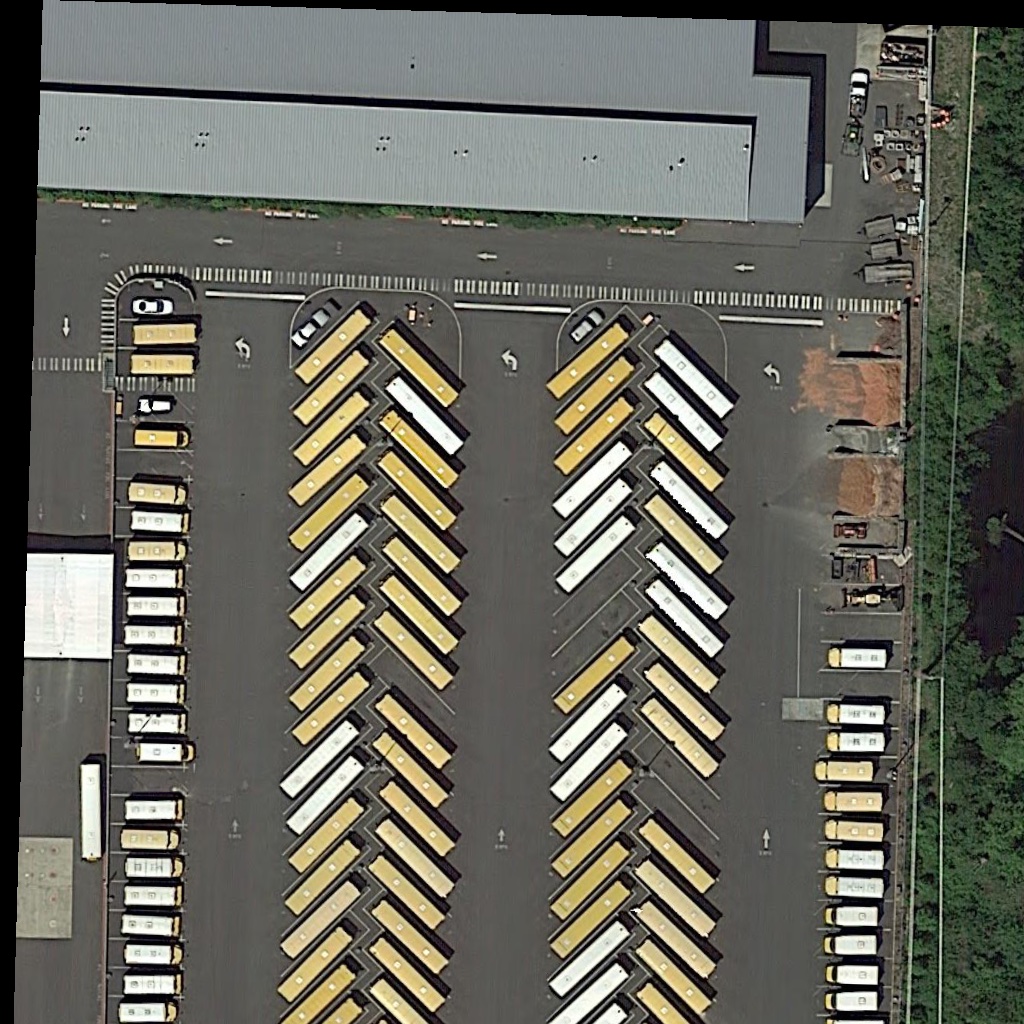 Input: demo.jpg — DOTA aerial bus lot