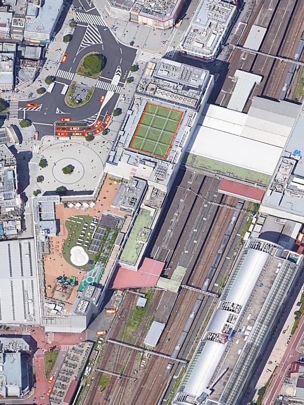 FAIR1M val — ground-truth oriented boxes on a sports-field scene (research illustration; not a dataset mirror)