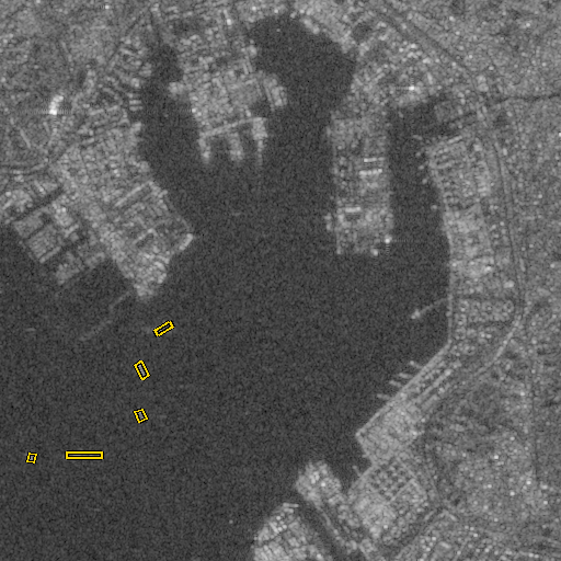 The same harbor chip. Five rotated ground-truth boxes.